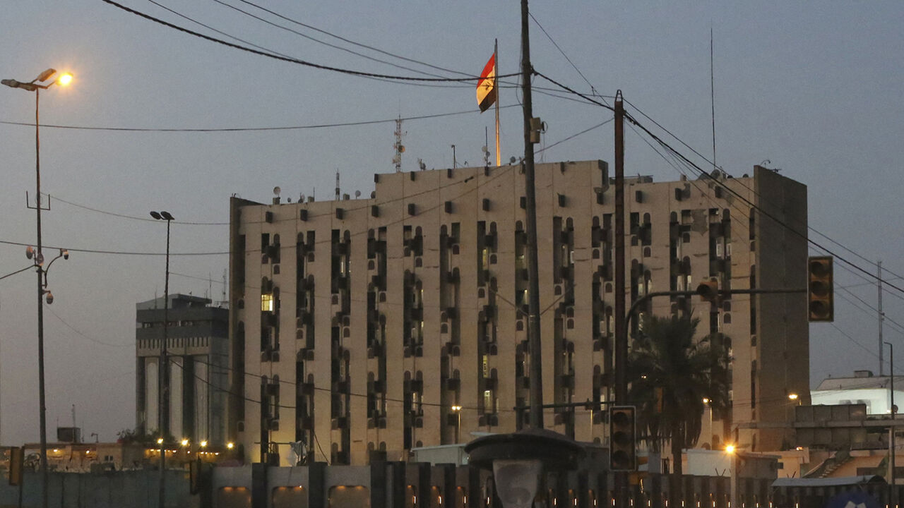 Motorists commute near the Iraqi Intelligence Service headquarters in Baghdad's Green Zone on Nov. 7, 2021.