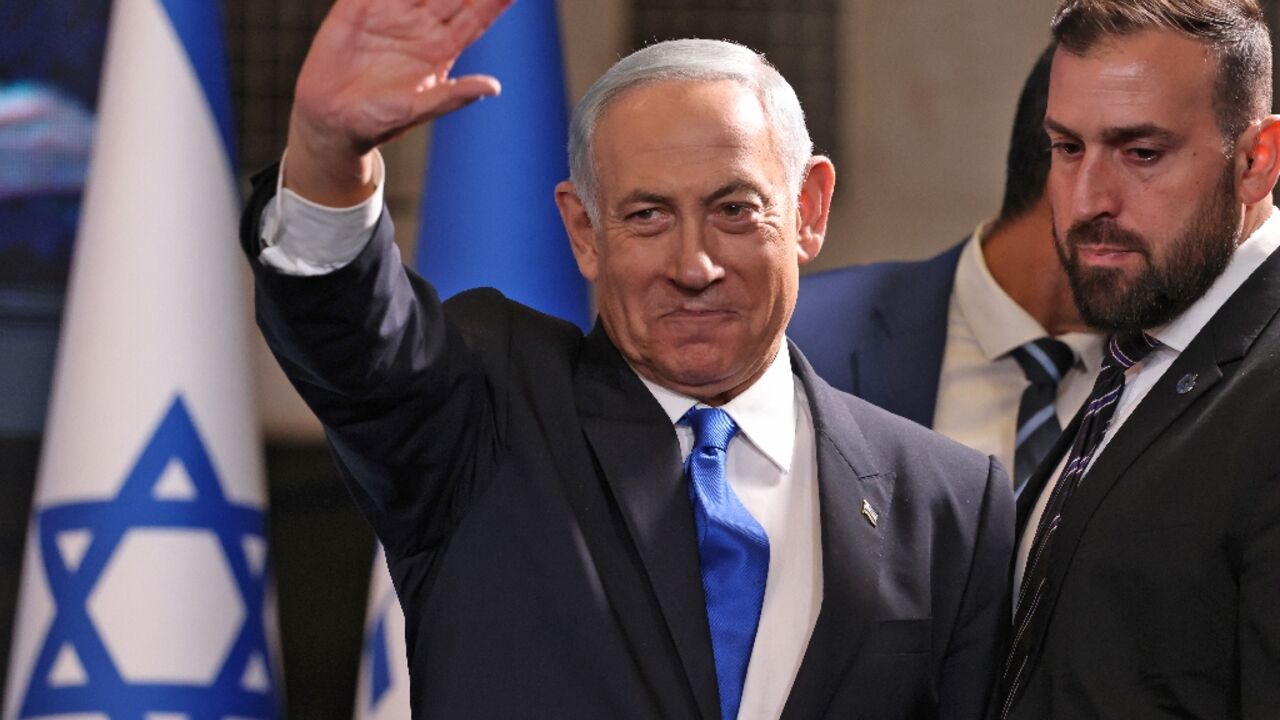 Former Israeli prime minister Benjamin Netanyahu greets right-wing supporters at campaign headquarters in Jerusalem as he scents victory in his bid for a political comeback Former Israeli prime minister Benjamin Netanyahu greets right-wing supporters at campaign headquarters in Jerusalem as he scents victory in his bid for a political comeback