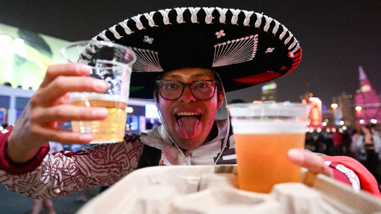 Some thirsty World Cup fans waited an hour for the Budweiser stand to open at the official fan zone