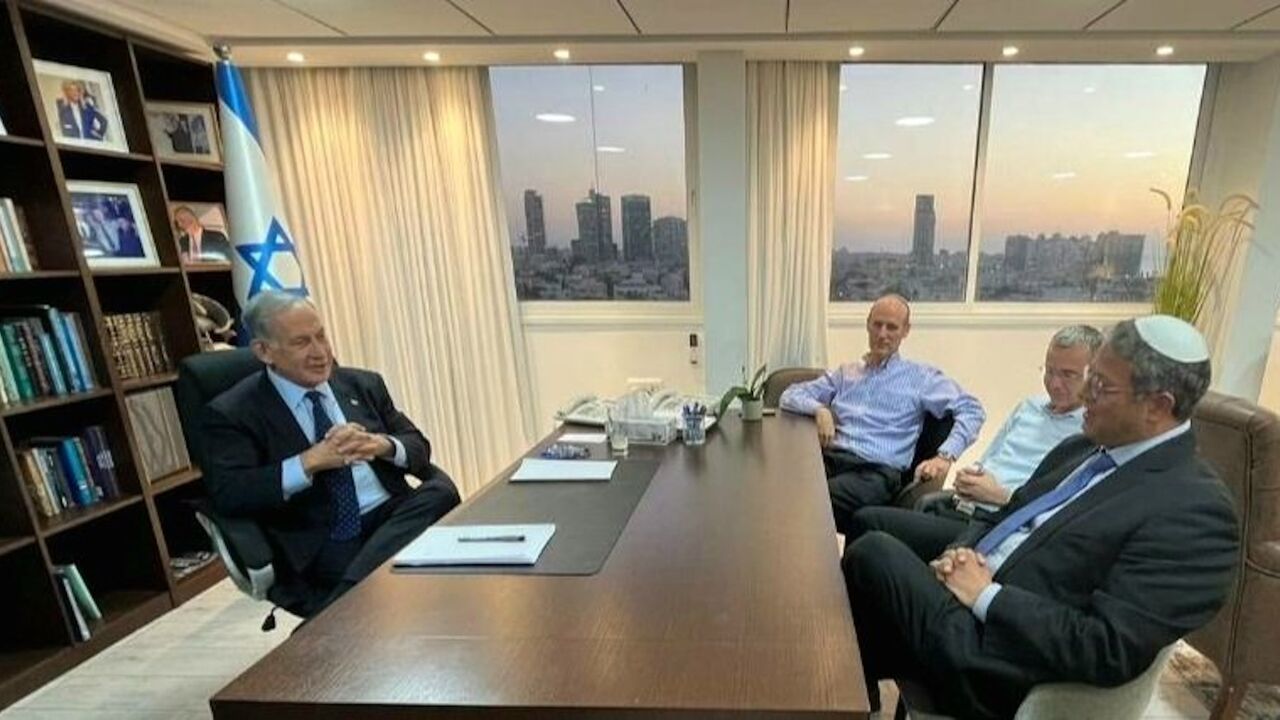 Prime Minister-designate Benjamin Netanyahu (L) meets with Jewish Power leader Itamar Ben-Gvir at his office, Jerusalem, Nov. 7, 2022.