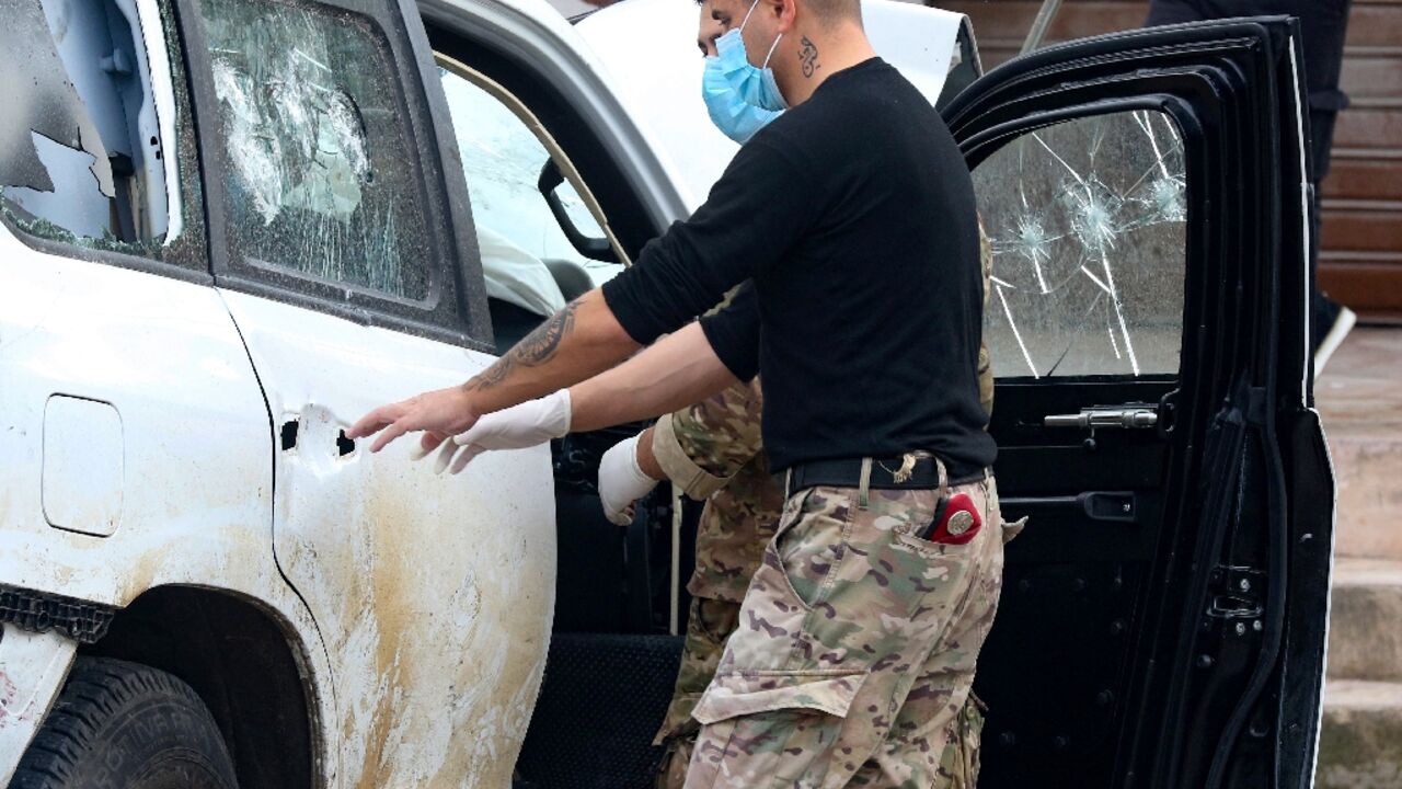 Lebanese forces check the site where a UN peacekeeping force UNIFIL convoy came under fire, in the village of Aqibya in south Lebanon Lebanese forces check the site where a UN peacekeeping force UNIFIL convoy came under fire, in the village of Aqibya in south Lebanon