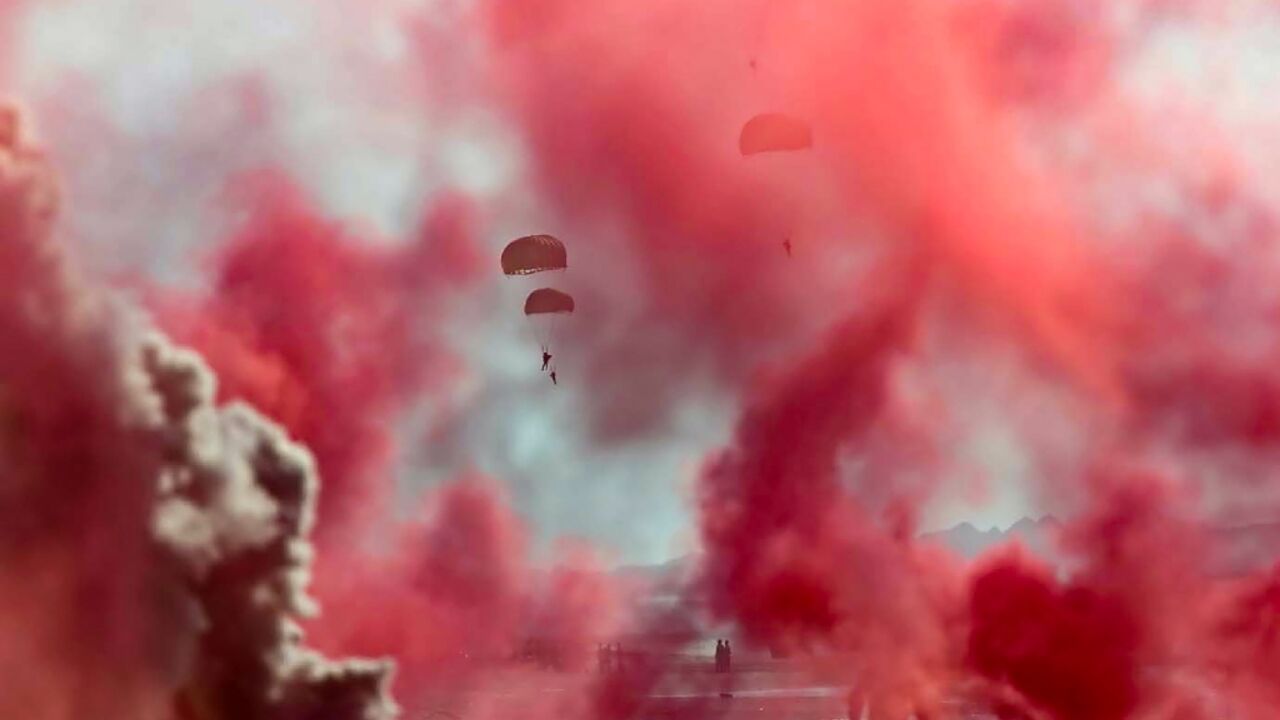 A handout picture provided by the Iranian Army on September 10, 2020, shows Iranian army paragliders during a military exercise near the strategic Strait of Hormuz in southern Iran A handout picture provided by the Iranian Army on September 10, 2020, shows Iranian army paragliders during a military exercise near the strategic Strait of Hormuz in southern Iran