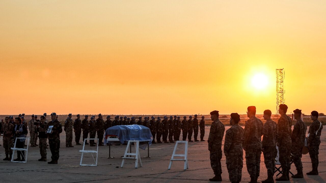 Peacekeepers of the United Nations Interim Force in Lebanon (UNIFIL) attend the repatriation ceremony for Irish Private Sean Rooney Peacekeepers of the United Nations Interim Force in Lebanon (UNIFIL) attend the repatriation ceremony for Irish Private Sean Rooney