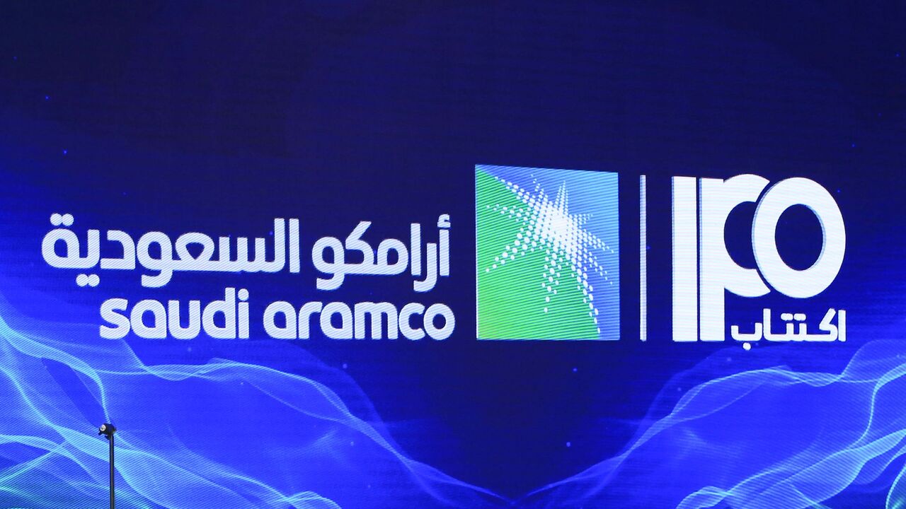 A picture taken on November 3, 2019 shows a sign of Saudi Aramco's initial public offering (IPO) during a press conference by the state company in the eastern Saudi Arabian region of Dhahran. - Saudi Aramco confirmed it planned to list on the Riyadh stock exchange, describing it as a "significant milestone" in the history of the energy giant. (Photo by - / AFP) (Photo by -/AFP via Getty Images)