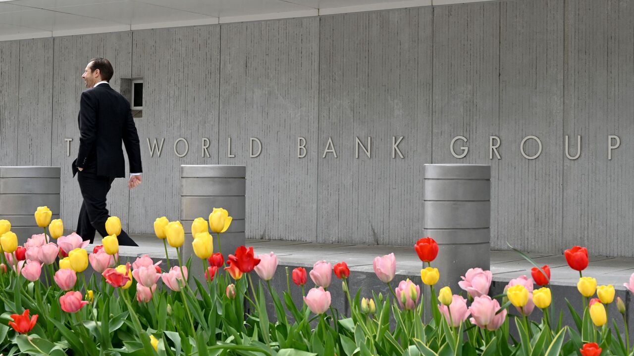 A man walks past the World Bank building in Washington on April 21, 2022.