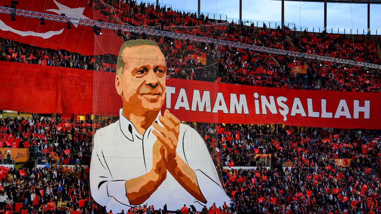 AKP party supporters attend the "Unity, Will, Victory" rally at the Galatasaray's Nef Stadium in Istanbul on Nov. 27, 2022, six months ahead of Turkey's next presidential elections.