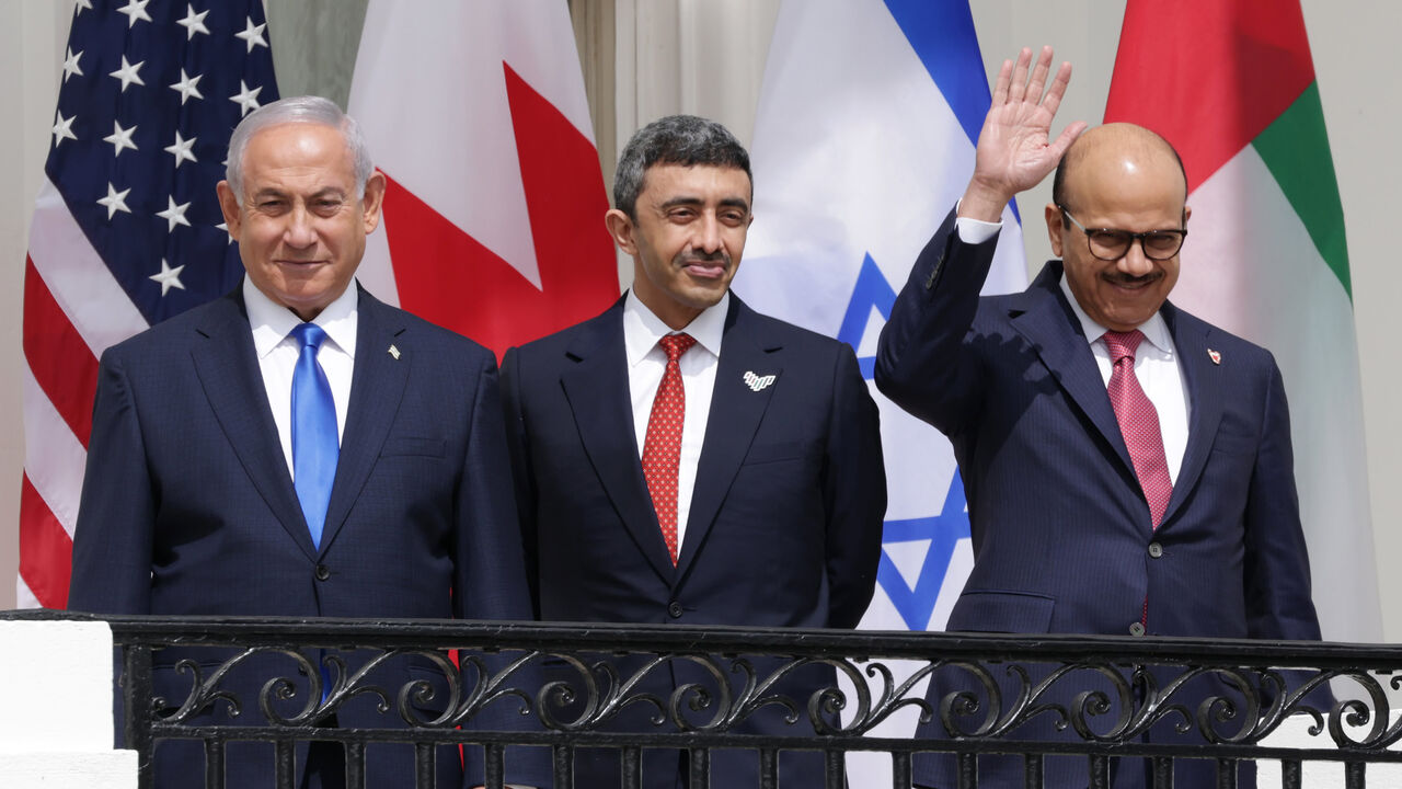 Israeli Prime Minister Benjamin Netanyahu, Foreign Affairs Minister of the United Arab Emirates Abdullah bin Zayed bin Sultan Al Nahyan and Foreign Affairs Minister of Bahrain Abdullatif bin Rashid Al Zayani participate in the signing ceremony of the Abraham Accords on the South Lawn of the White House, Washington, Sept. 15, 2020.