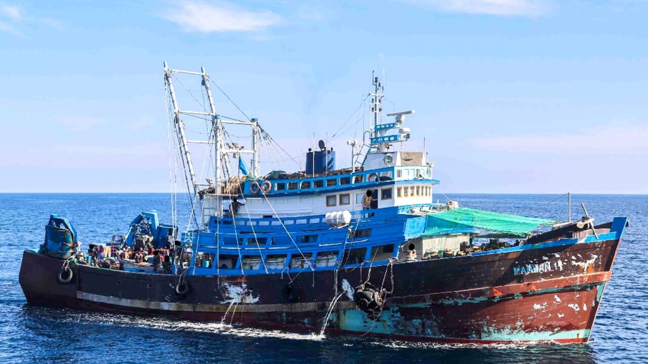 A fishing trawler intercepted by the US Navy was reportedly carrying 'significant' amounts of ammunition bound for Yemen, pictured in this US handout photograph A fishing trawler intercepted by the US Navy was reportedly carrying 'significant' amounts of ammunition bound for Yemen, pictured in this US handout photograph