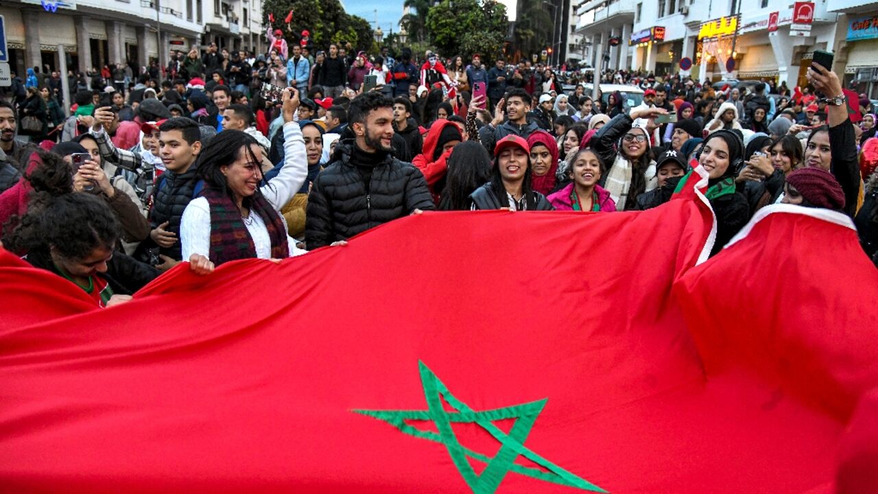 Moroccan fans celebrate in the capital Rabat after their team became the only one from an Arab nation to reach the World Cup second round Moroccan fans celebrate in the capital Rabat after their team became the only one from an Arab nation to reach the World Cup second round