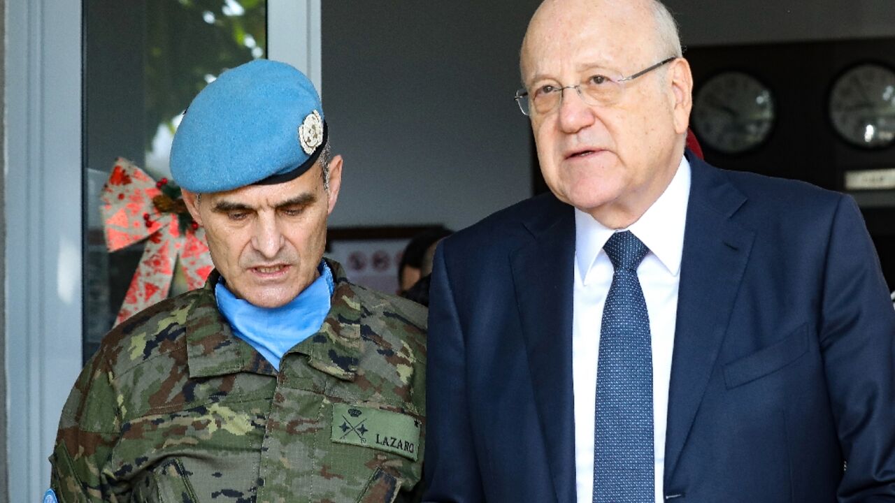 Lebanon's Najib Mikati visited the UNIFIL headquarters and vowed 'punishment' for the perpetrators of the attack Lebanon's Najib Mikati visited the UNIFIL headquarters and vowed 'punishment' for the perpetrators of the attack