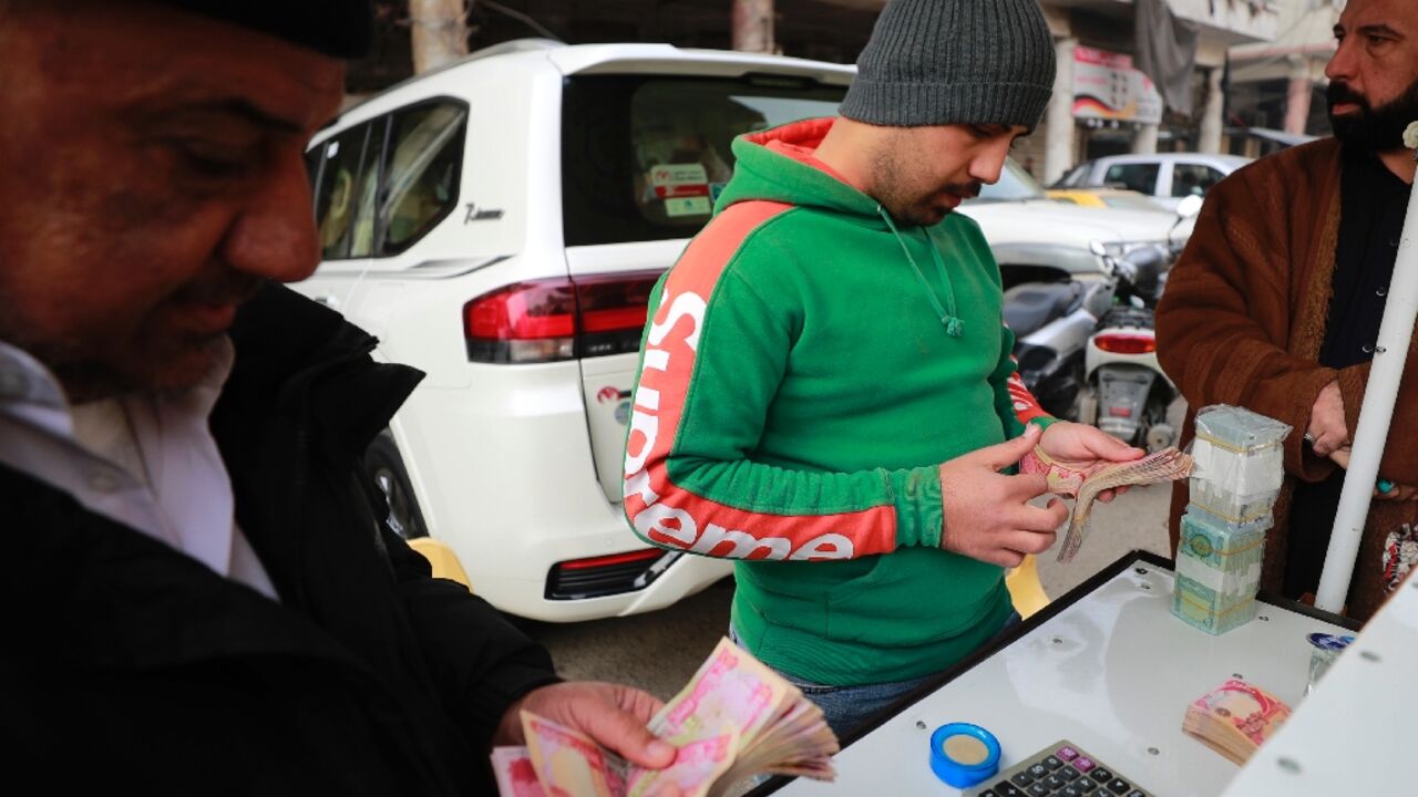 The dinar's depreciation has sent panic through the Iraqi population, which fears a price surge on imported goods The dinar's depreciation has sent panic through the Iraqi population, which fears a price surge on imported goods