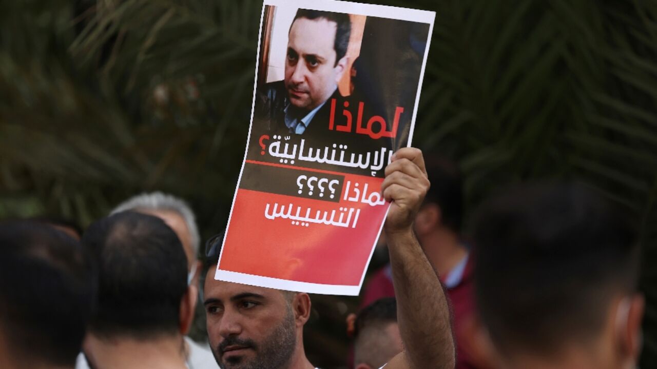 Lebanese judge Tarek Bitar has become a bugbear for Shiite activists, who accuse him of bias in his stewardship of the official investigation into alleged negligence in last year's devastating explosion in Beirut port Lebanese judge Tarek Bitar has become a bugbear for Shiite activists, who accuse him of bias in his stewardship of the official investigation into alleged negligence in last year's devastating explosion in Beirut port