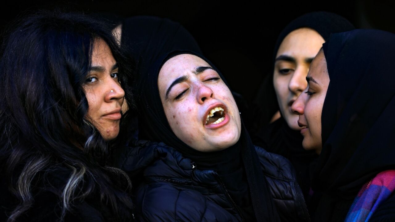 The daughter of Jawad Farid Bawaqna, killed on Thursday, cries during his funeral in the Jenin refugee camp in the West Bank The daughter of Jawad Farid Bawaqna, killed on Thursday, cries during his funeral in the Jenin refugee camp in the West Bank