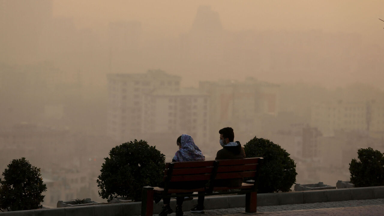 Smog obscures the view from the Saad Abad mountain north of the Iranian capital, Tehran.