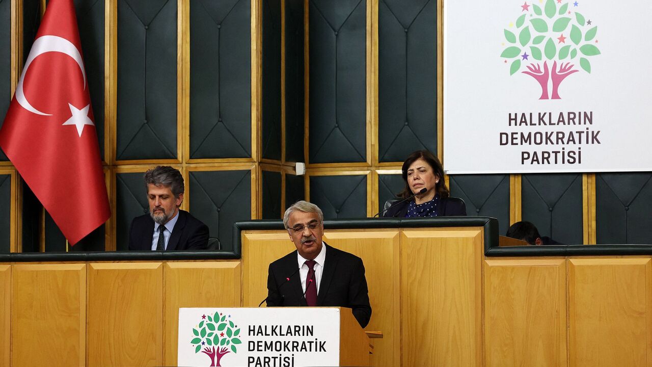 Co-leader of the People's Democratic Party (HDP) Mithat Sancar (C).