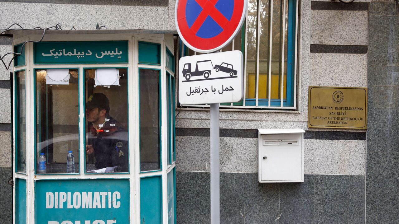 A policeman guards the entrance of the Azerbaijan embassy in Tehran on January 27, 2023, following an attack. - Azerbaijan on January 27 said it was evacuating staff from its embassy in Tehran, blaming Iran for a "terrorist" attack in which the head of security was killed and two guards wounded. (Photo by -/AFP via Getty Images)