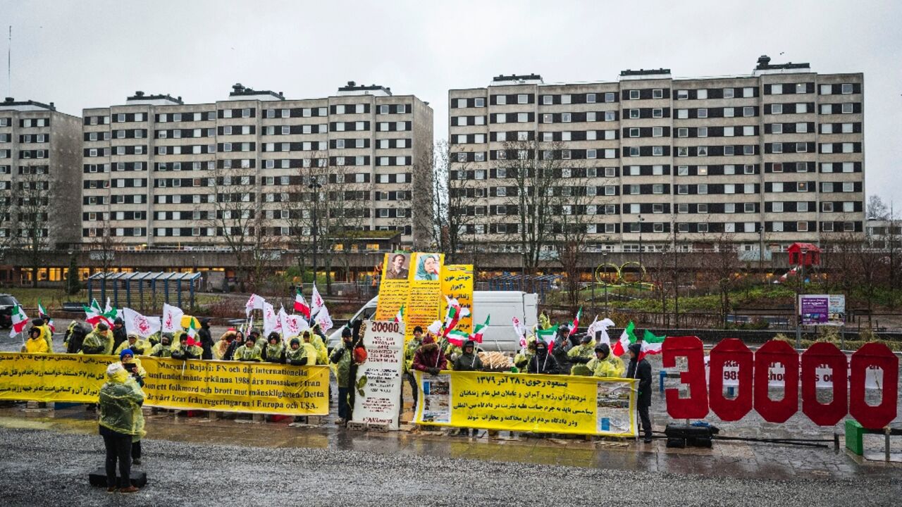 Protesters opposed the regime in Iran gathered outside the Stockholm courthouse as appeal trial opened Protesters opposed the regime in Iran gathered outside the Stockholm courthouse as appeal trial opened