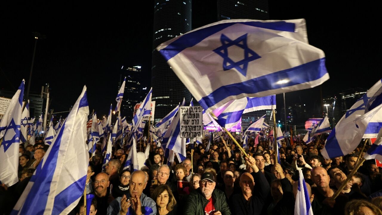 Tens of thousands of Israelis throng central Tel Aviv for the largest protest so far against the most right-wing government in the country's history Tens of thousands of Israelis throng central Tel Aviv for the largest protest so far against the most right-wing government in the country's history