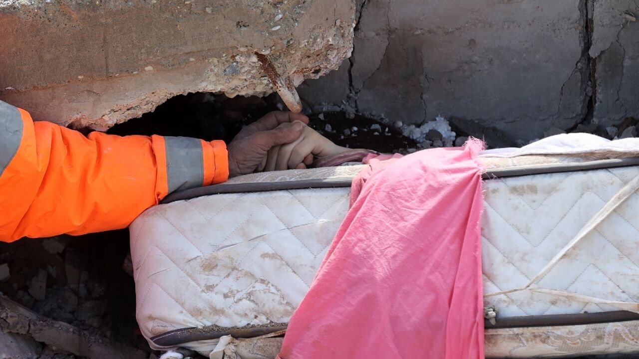 Heartrending scenes of a broken father clutching his dead daughter's hand have laid bare the human cost of violent earthquakes in Syria and Turkey