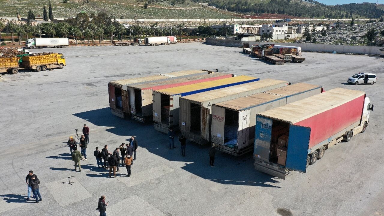 This aerial view shows a United Nations aid convoy that entered rebel-held northwestern Syria from Turkey through the Bab el-Hawa crossing This aerial view shows a United Nations aid convoy that entered rebel-held northwestern Syria from Turkey through the Bab el-Hawa crossing