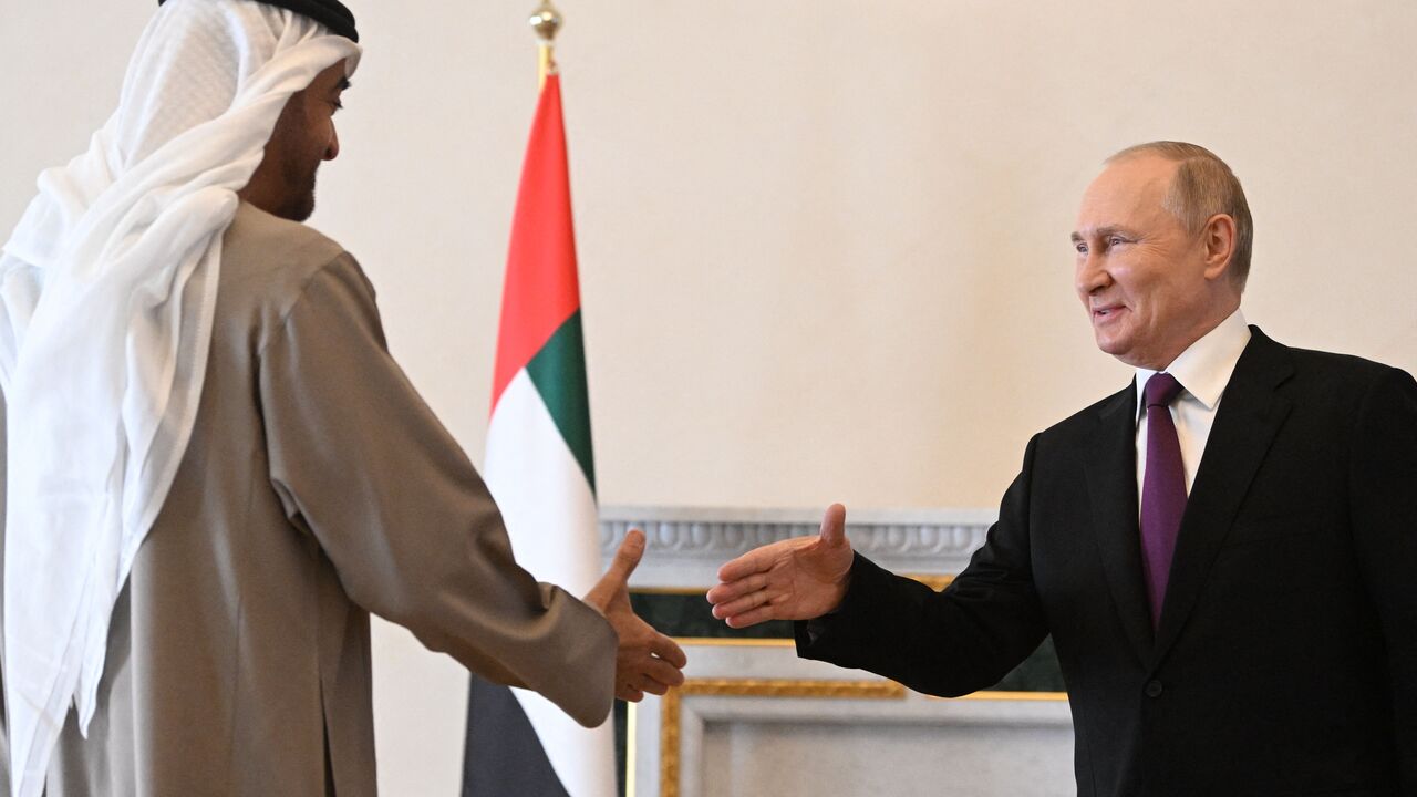 Russian President Vladimir Putin meets with United Arab Emirates President Sheikh Mohamed bin Zayed Al-Nahyan in Saint Petersburg on October 11, 2022. (Photo by PAVEL BEDNYAKOV/SPUTNIK/AFP via Getty Images)