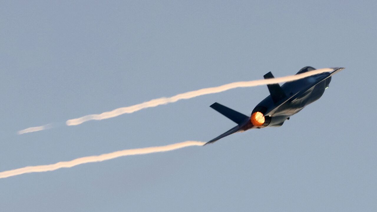 An Israeli Air Force F-35 Lightning II fighter jet performs during a graduation ceremony of Israeli Air Force pilots, at the Hatzerim base in the Negev desert, near the southern city of Beer Sheva, on December 28, 2022. (Photo by JACK GUEZ / AFP) (Photo by JACK GUEZ/AFP via Getty Images)