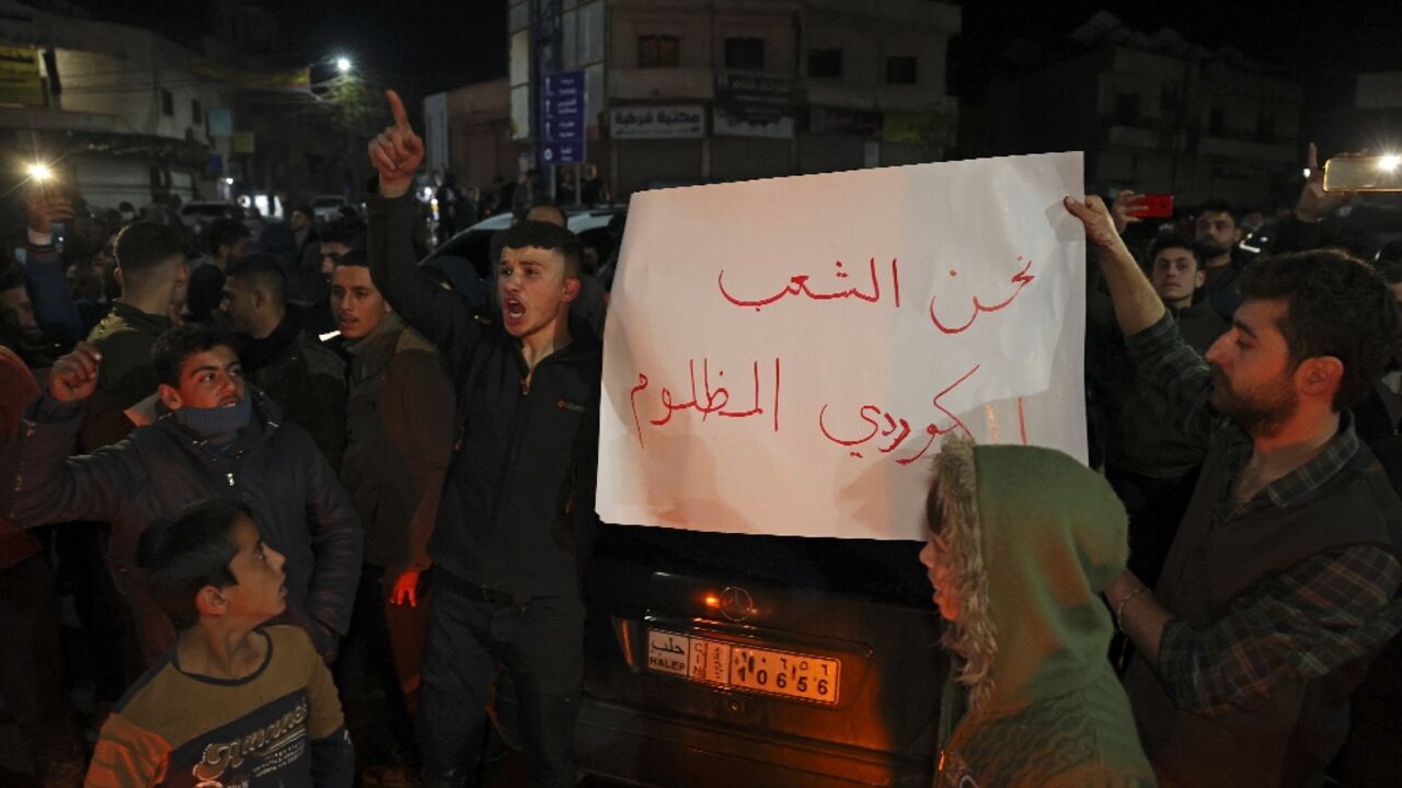 Syrian Kurds protest in the northern town of Atme over the killing by Turkish-backed rebels of four fellow Kurds celebrating the Nowruz festival in the nearby town of Jindayris