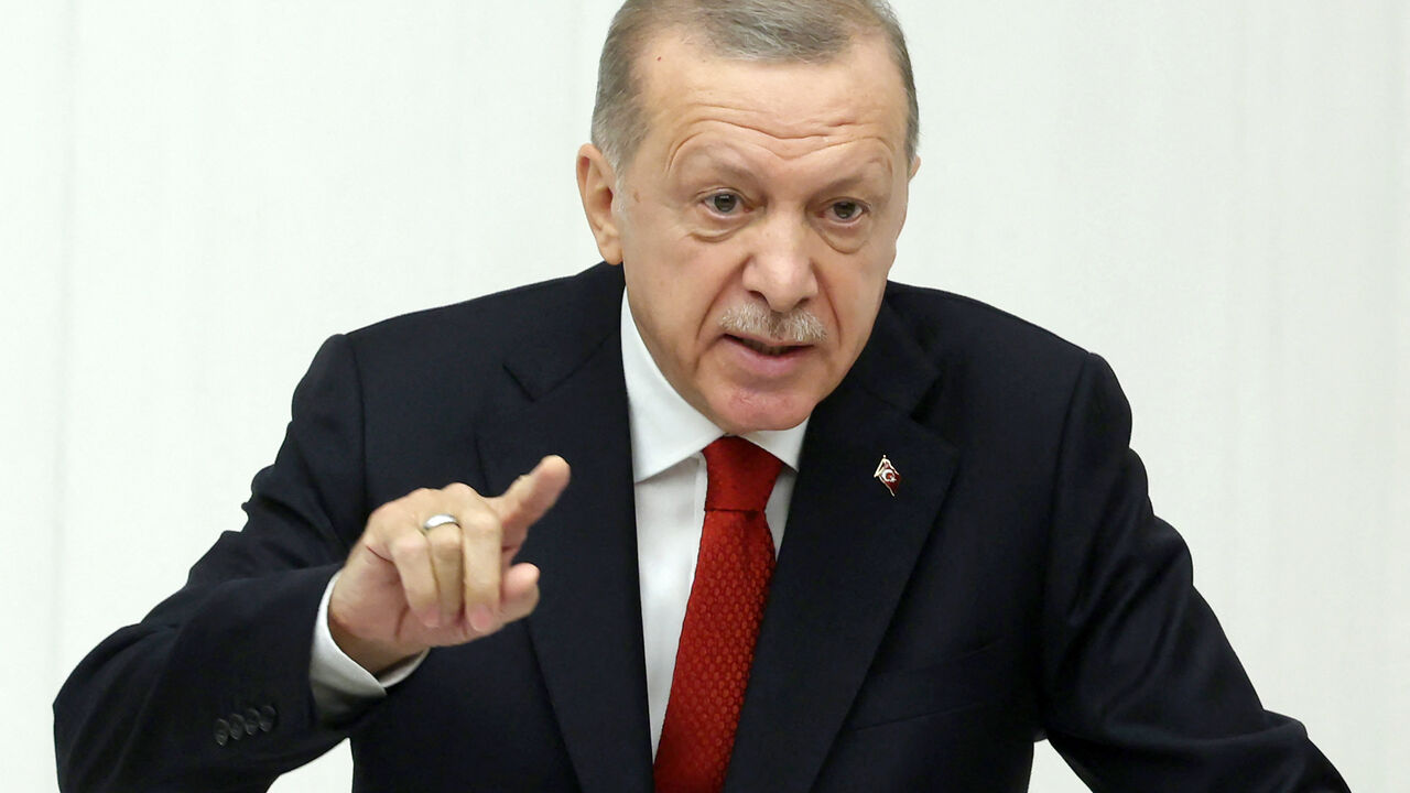 Turkish President Recep Tayyip Erdogan addresses the parliament to mark the opening of the new legislative year, at the Grand National Assembly of Turkey in Ankara, on October 1, 2022. - President Recep Tayyip Erdogan on October 1, 2022 warned Turkey would not ratify the NATO membership bids of Sweden and Finland until the two Nordic countries "kept" promises they had made to Ankara. (Photo by Adem ALTAN / AFP) (Photo by ADEM ALTAN/AFP via Getty Images)