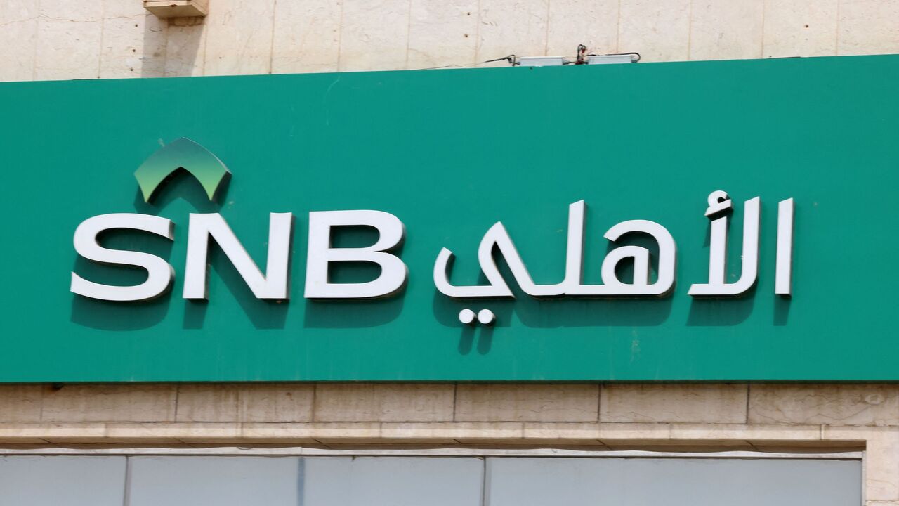 The logo of the Saudi National Bank (SNB) can be seen at a branch in Riyadh on March 27, 2023, after the chairman of SNB, the main shareholder of troubled lender Credit Suisse which was bought out this month, resigned.