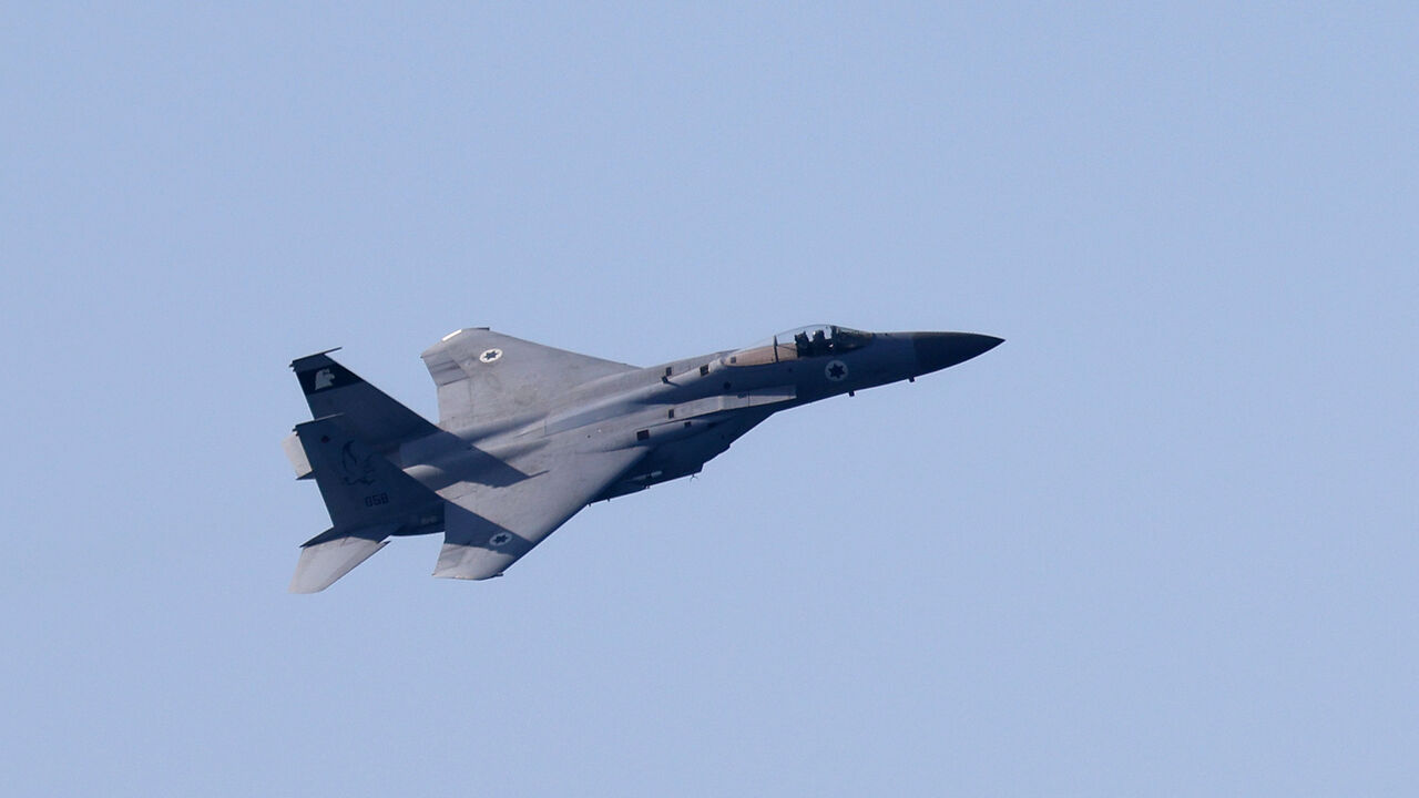 An Israeli F-15 Eagle fighter aircraft performs manuevers during the "Noble Dina 23" multilateral aeronautical exercise over the Mediterranean sea on March 27, 2023. (Photo by JACK GUEZ / AFP) (Photo by JACK GUEZ/AFP via Getty Images)