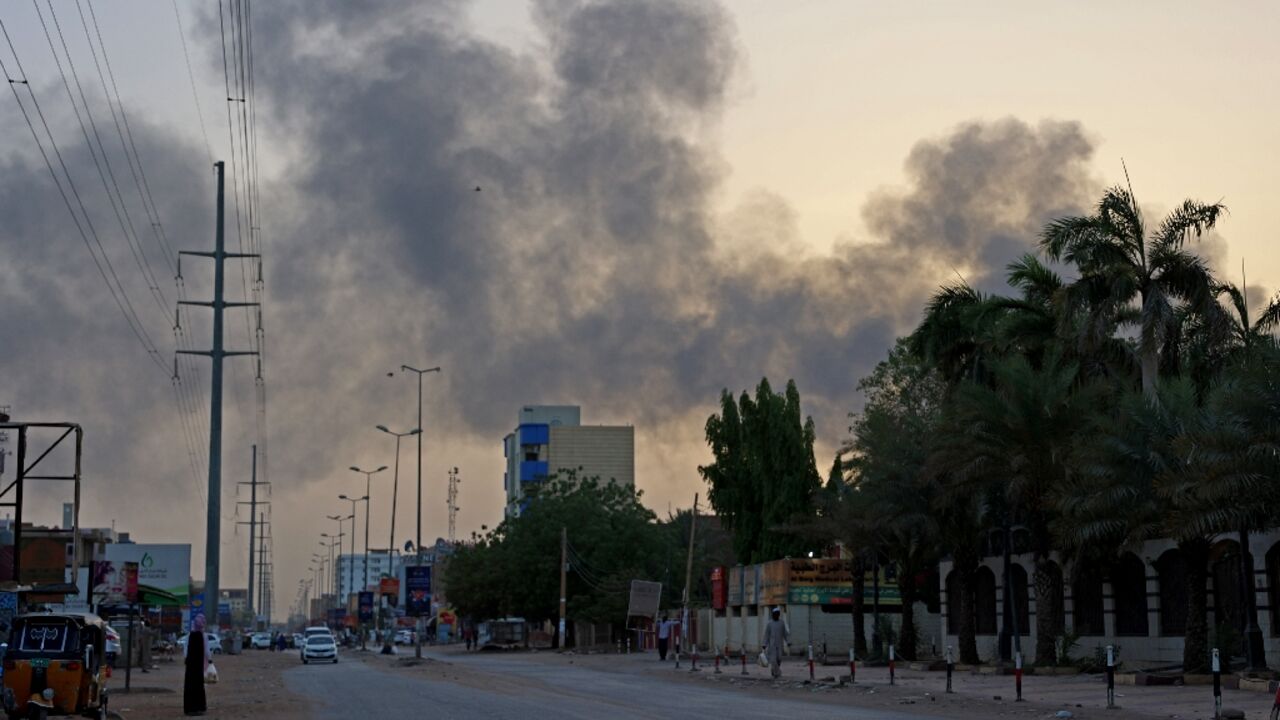 Smoke billows above residential buildings in east Khartoum as fighting in Sudan raged for a second day Smoke billows above residential buildings in east Khartoum as fighting in Sudan raged for a second day