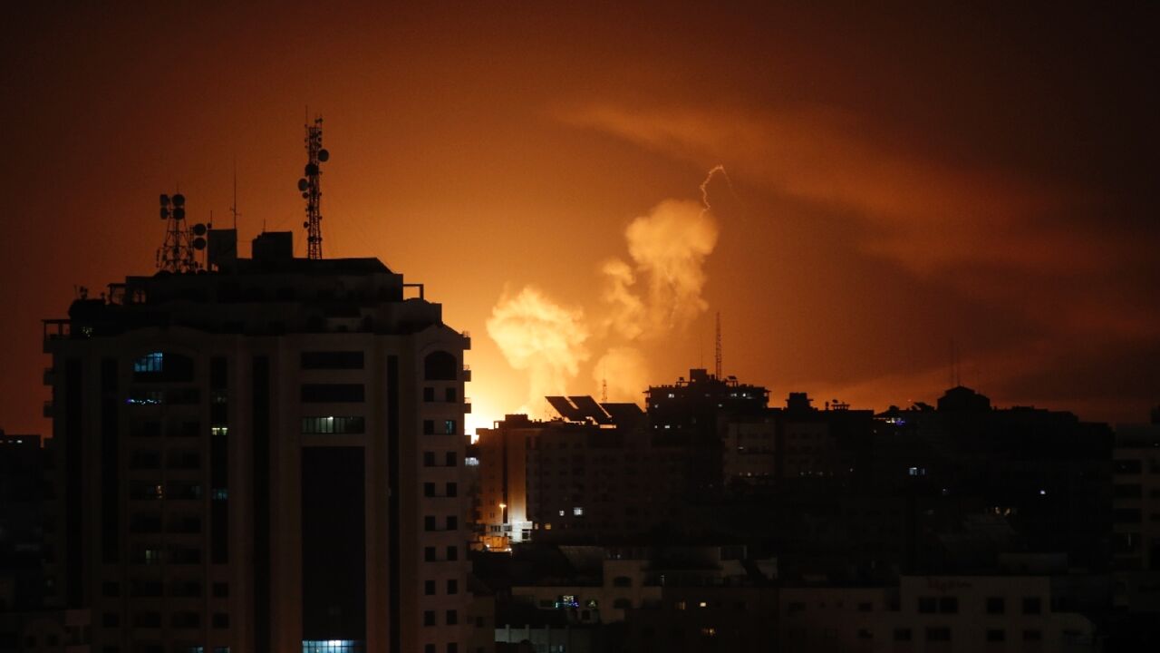 Smoke rises above buildings in Gaza City as Israel launches air strikes on the Palestinian enclave Smoke rises above buildings in Gaza City as Israel launches air strikes on the Palestinian enclave