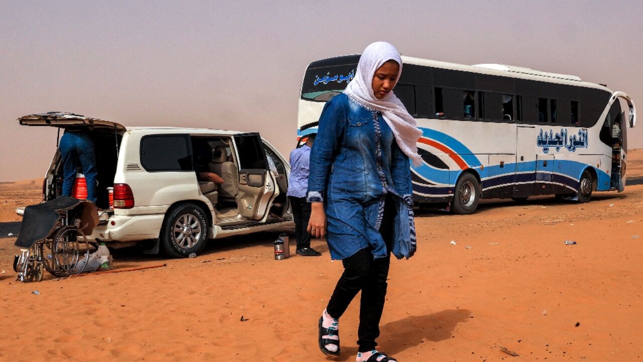 A rest stop on the route which thousands are trying to take north, at al-Gabolab in Sudan's Northern State