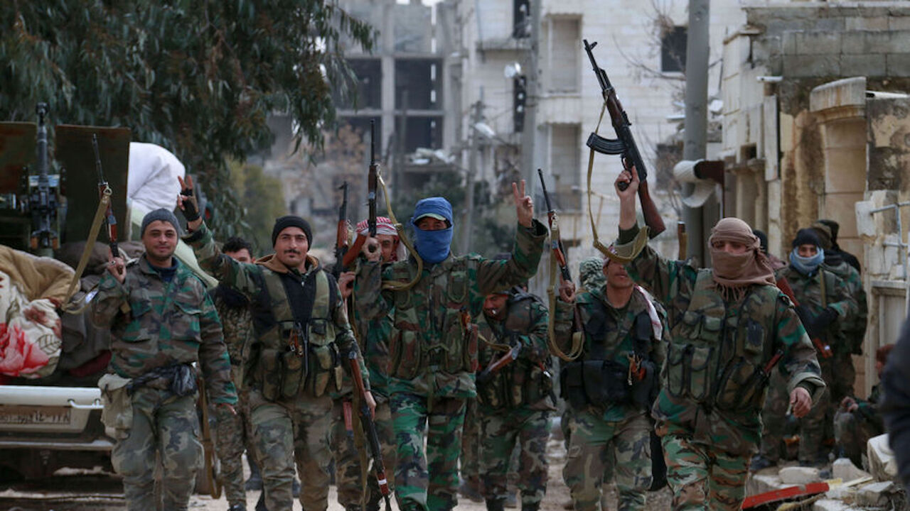 Members of the Syrian army deploy in the al-Rashidin 1 district, in Aleppo's southwestern countryside, on Feb. 16, 2020.