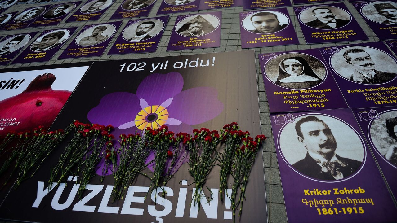 Portraits of Armenian intellectuals, detained and deported in 1915, are displayed during a rally on the Istiklal avenue in Istanbul, on April 24, 2017 to commemorate the 102nd anniversary of the 1915 mass killing of Armenians in the Ottoman Empire. 