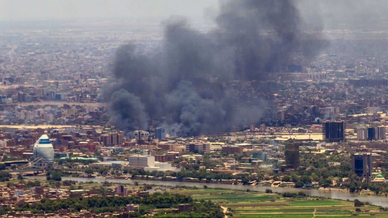 Smoke billows over the Sudanese capital on Wednesday as persistent fighting undermines efforts to firm up a truce between the country's warring generals