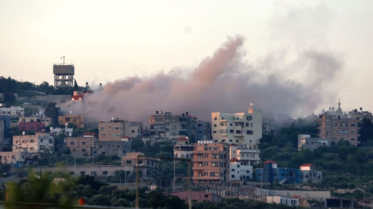 Smoke billows over the West Bank village of Hares as Israeli troops demolish the home of a Palestinian accused of killing three Israelis in a car-ramming and stabbing attack last year Smoke billows over the West Bank village of Hares as Israeli troops demolish the home of a Palestinian accused of killing three Israelis in a car-ramming and stabbing attack last year