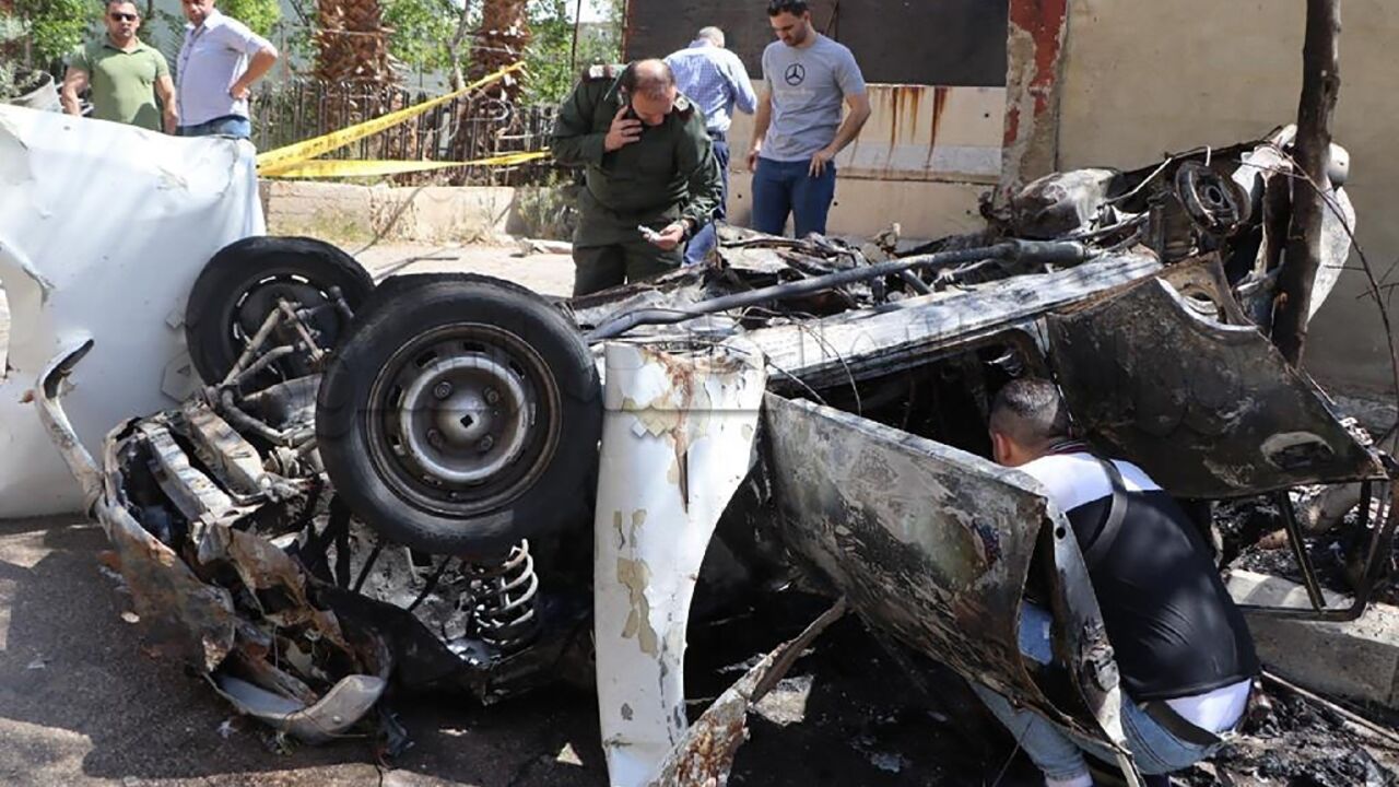 Syrian investigators at the site of an explosion in Damascus on May 10, 2023, seen in a picture provided by the interior ministry