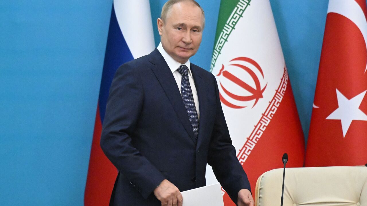 Russian President Vladimir Putin attends a joint press conference with his Iranian and Turkish counterparts following their summit in Tehran on July 19, 2022. (Photo by Grigory SYSOYEV / SPUTNIK / AFP) (Photo by GRIGORY SYSOYEV/SPUTNIK/AFP via Getty Images)