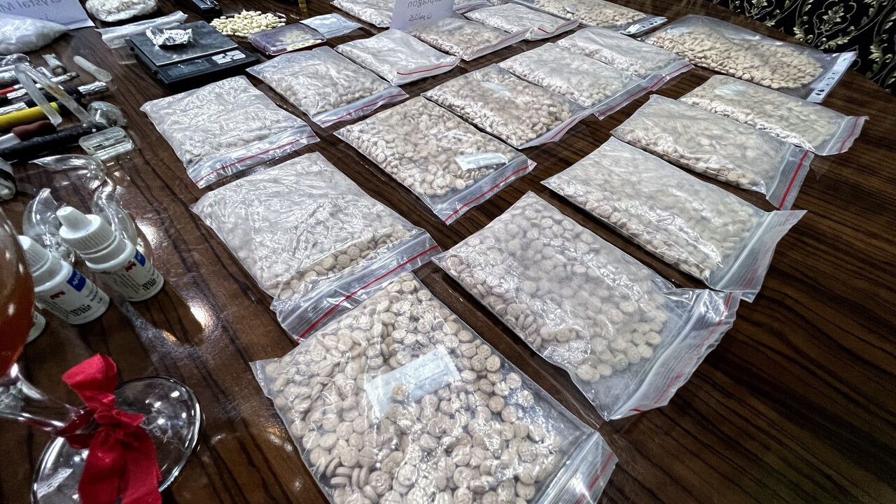 Seized drugs, including Captagon, are displayed for the media in the town of Marea, in the northern Aleppo countryside, on May 24, 2022, following clashes among different Turkey-backed factions in Syria. - A decade of appalling civil war has left Syria fragmented and in ruins but one thing crosses every frontline: the drug fenethylline, commercially known as captagon. The stimulant -- once notorious for its association with Islamic State fighters -- has spawned an illegal $10-billion industry that not only