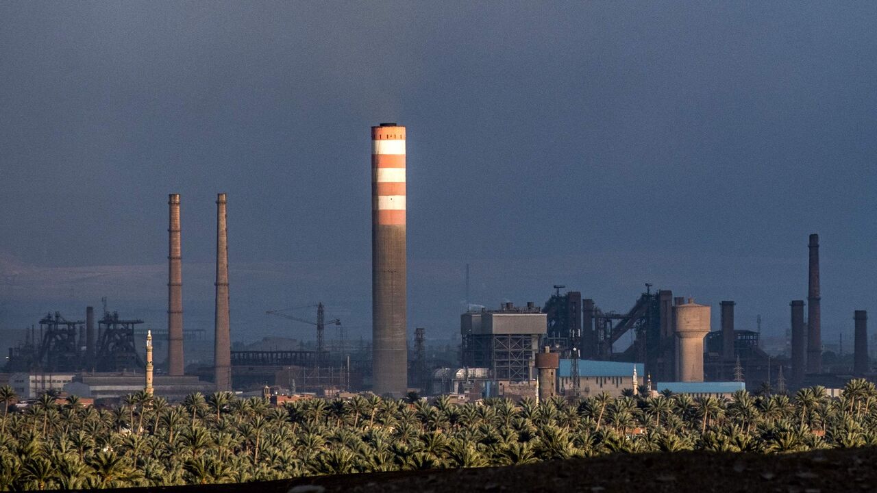 This picture taken on February 6, 2023 shows a view of Tibbin dual fuel (natural gas and fuel oil) powerplant and Helwan Steelworks, in the Helwan suburb south of Egypt's capital. (Photo by Amir MAKAR / AFP) (Photo by AMIR MAKAR/AFP via Getty Images)