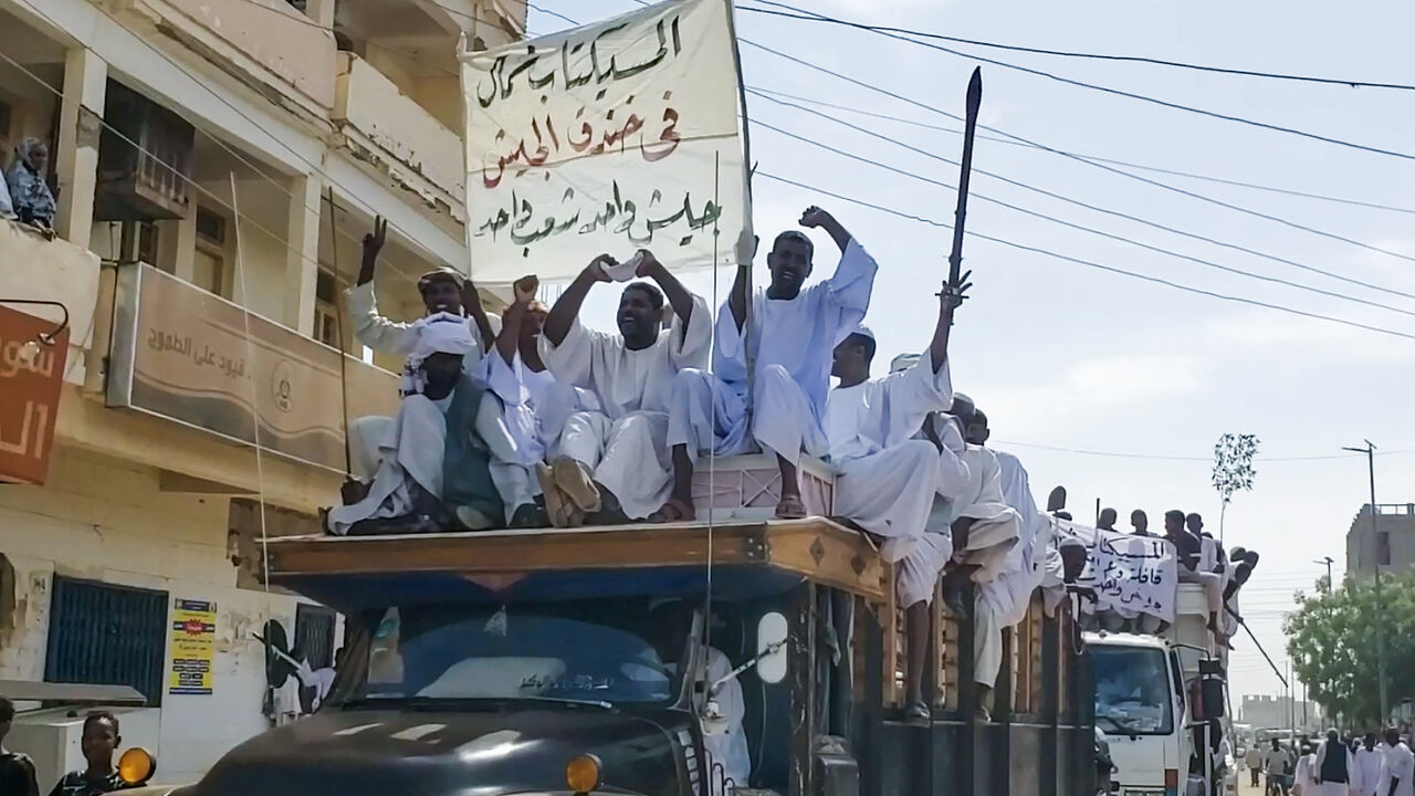 People form a convoy as they celebrate in support of the Sudanese armed forces in Khartoum on May 12, 2023.