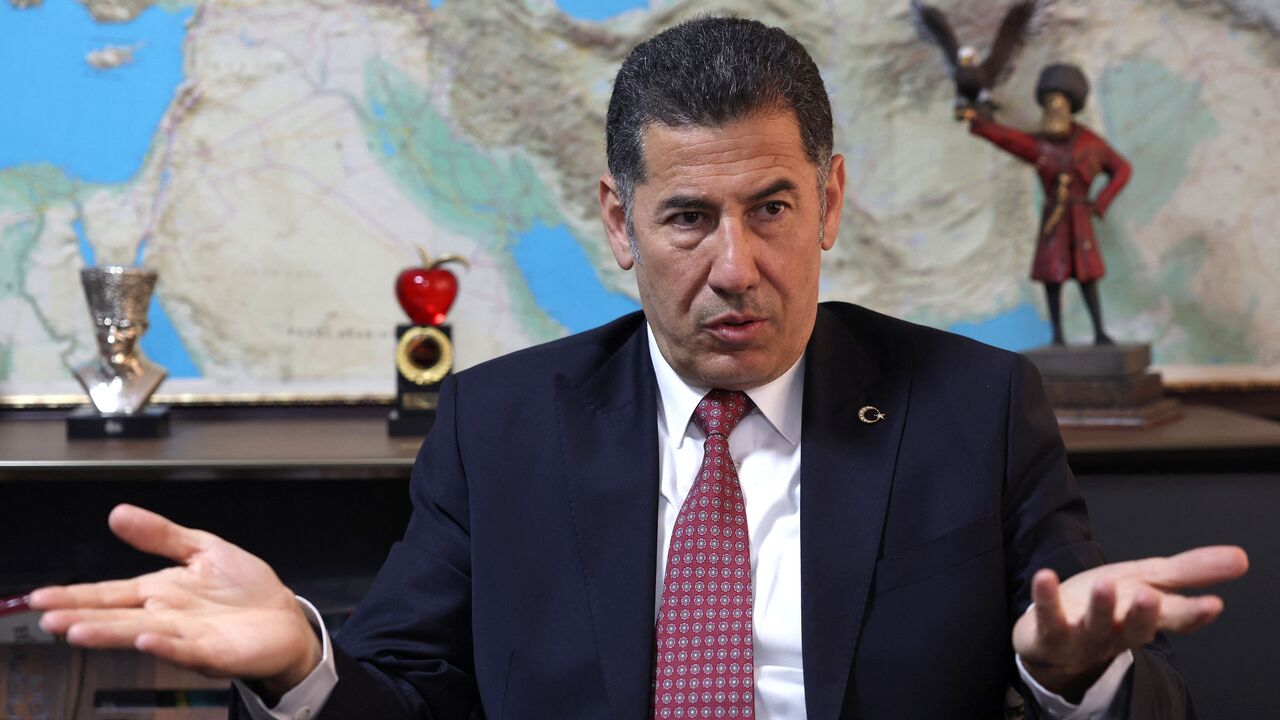 Sinan Ogan, Turkish academician and presidential candidate of the ATA (Ataturk) nationalist alliance speaks during an interview with AFP, in his office in Ankara, on May 16, 2023. Turkey's election officials confirmed that there would be a second round because the remaining uncounted votes would not swing the outcome. Erdogan secured 49.5 percent of the vote and Kilicdaroglu picked up 44.9 percent. Nationalist candidate Sinan Ogan -- a former member of a far-right party now allied with the government -- won