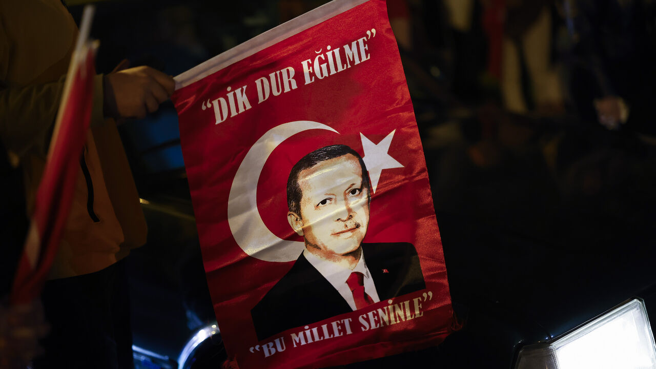 Supporters of Turkish President Recep Tayyip Erdogan celebrate.