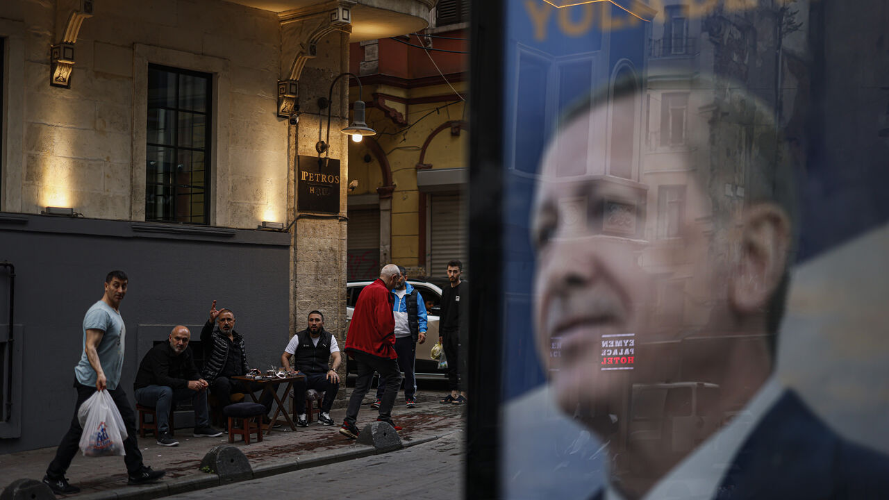 Men drink chai in the street the day after President Recep Tayyip Erdoğan was re-elected on May 29, 2023 in Istanbul,Turkey. Erdogan won another five-year term after being forced into a runoff with the opposition politician Kemal Kilicdaroglu. Erdogan prevailed despite criticism of his management of the country's economy and the government's response to the devastating earthquakes earlier this year. (Photo by Jeff J Mitchell/Getty Images)