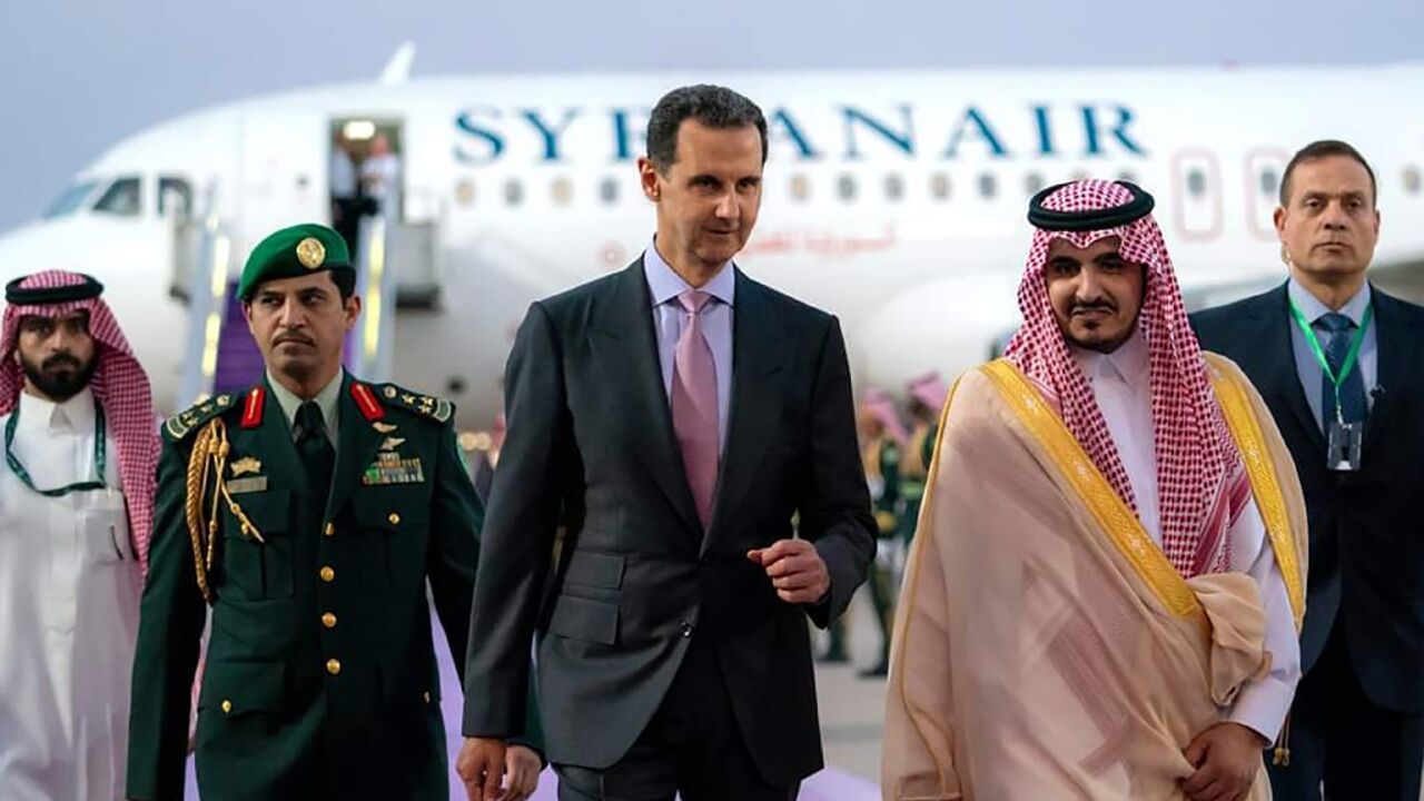 Syrian President Bashar al-Assad (L) is welcomed in Jeddah on the eve of the Arab League summit Syrian President Bashar al-Assad (L) is welcomed in Jeddah on the eve of the Arab League summit