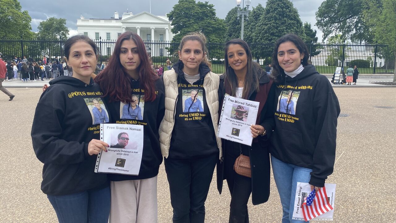 The Tahbaz and Shargi families demonstrating in front of the White House on May 3, 2023.