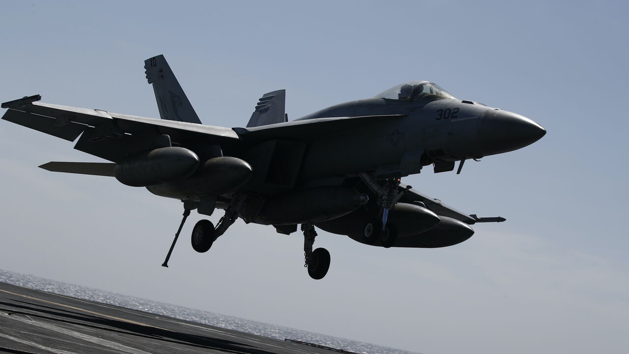 A US F-18 Super Hornet lands on the flight deck of the USS Nimitz (CVN-68) during a South Korea and US combined maritime exercise as a part of Warrior Shield at sea on March 27, 2023 off the coast of South Korea. 