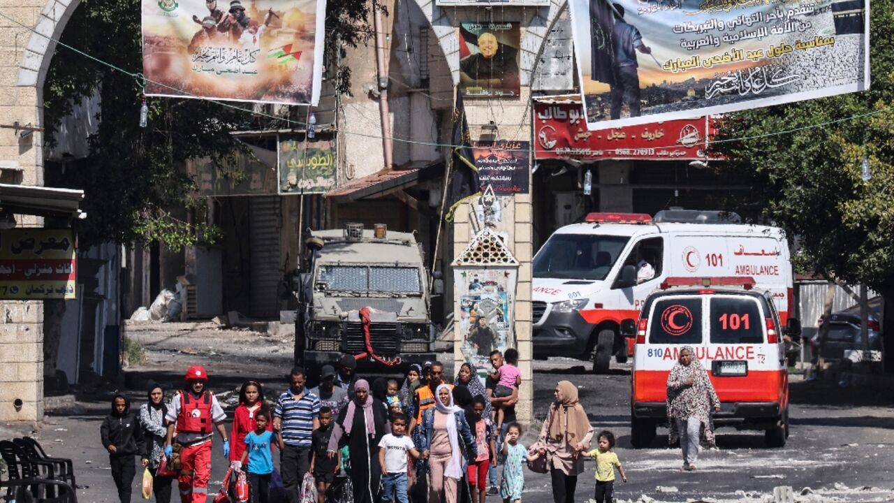 People flee the Jenin refugee camp in the occupied West Bank during an ongoing Israeli military operation People flee the Jenin refugee camp in the occupied West Bank during an ongoing Israeli military operation