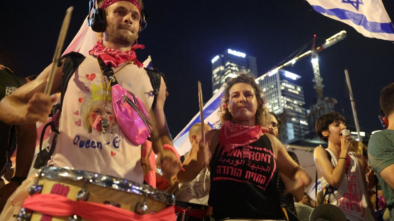 Protesters march in Tel Aviv against the judicial reforms 